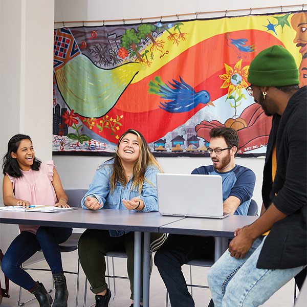 four yorku students around laptop