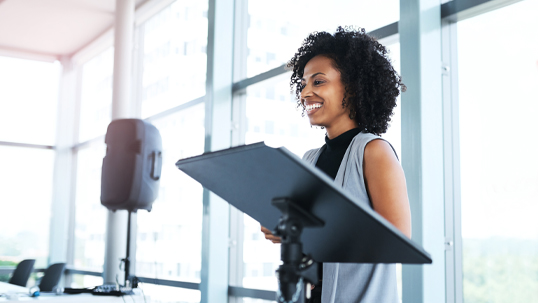 Woman speaking at podium