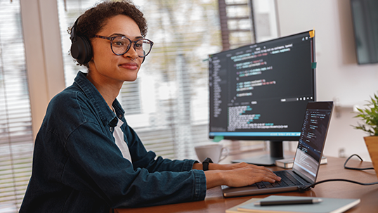 female student in front of laptop