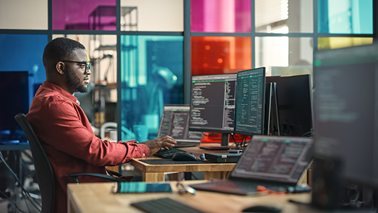 male student in front of computer