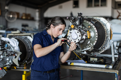 Woman working in a engineering apprenticeship role