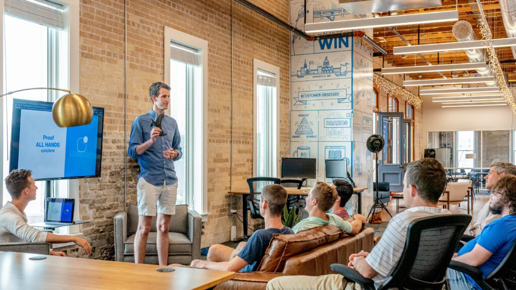 Photo of a man leading a presentation 1024 x 576