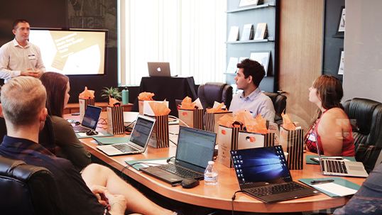 meeting and presentation with gift bags on conference table