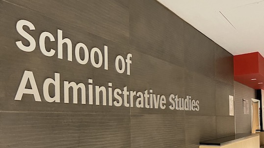 School of Administrative Studies front desk wall sign