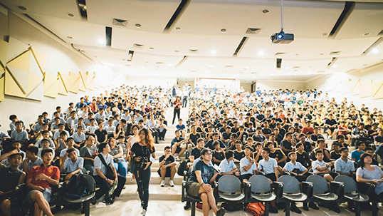A group of people at a conference