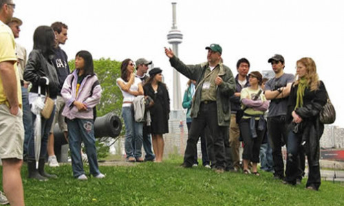 Certificate in Public History professor leading students on field trip to fort york in toronto