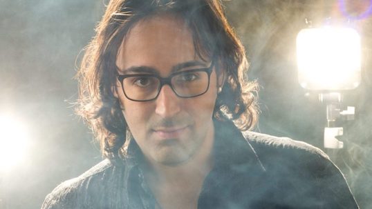 Mike D'Urzo magician sits in smoke and provides Testimonial for liberal arts at York University