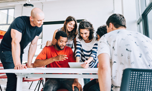 group of students studying around table