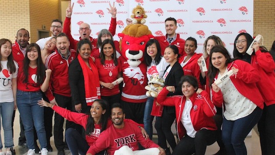 Student Community & Leadership Development team poses for a group photo 