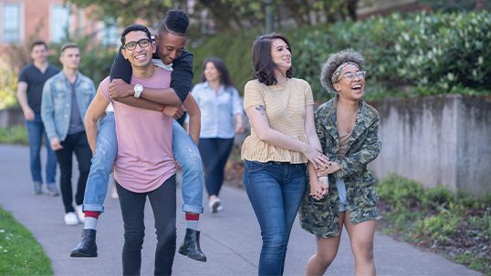 group of students walking on campus