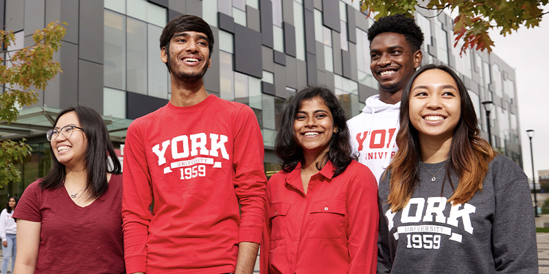 group of students outside a building on Keele campus