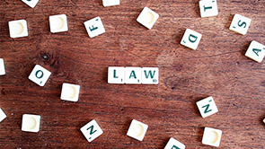 law spelled out with alphabet blocks