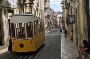 Tram on a city street in Lisbon