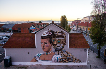 Artful graffiti on side of Lisbon building