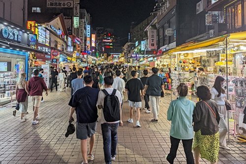 Photo of a busy Seoul street at night