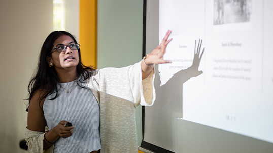 Female lecturer teaches a class