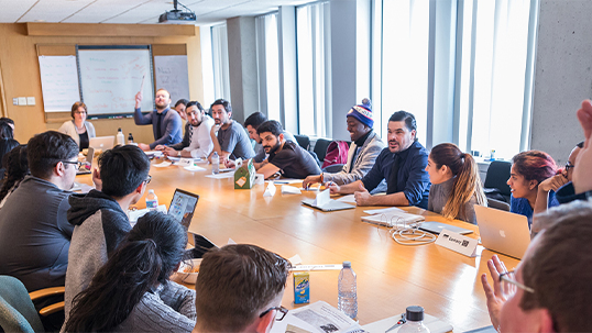 group of multicultural colleagues have a meeting in a conference room