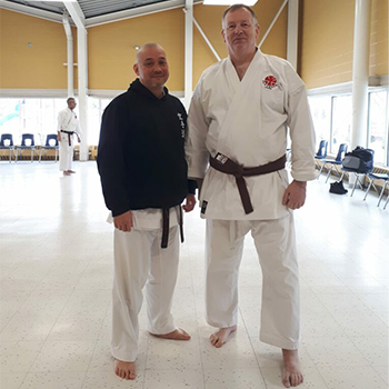 Sensei Daniel Tsumara with Phillips (right), who was promoted to black belt (Shodan) earlier this year