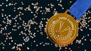 medal with a confetti background