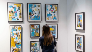 Woman looking at art at a gallery