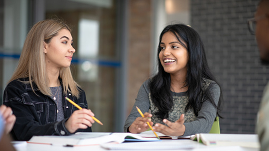 two female students studying