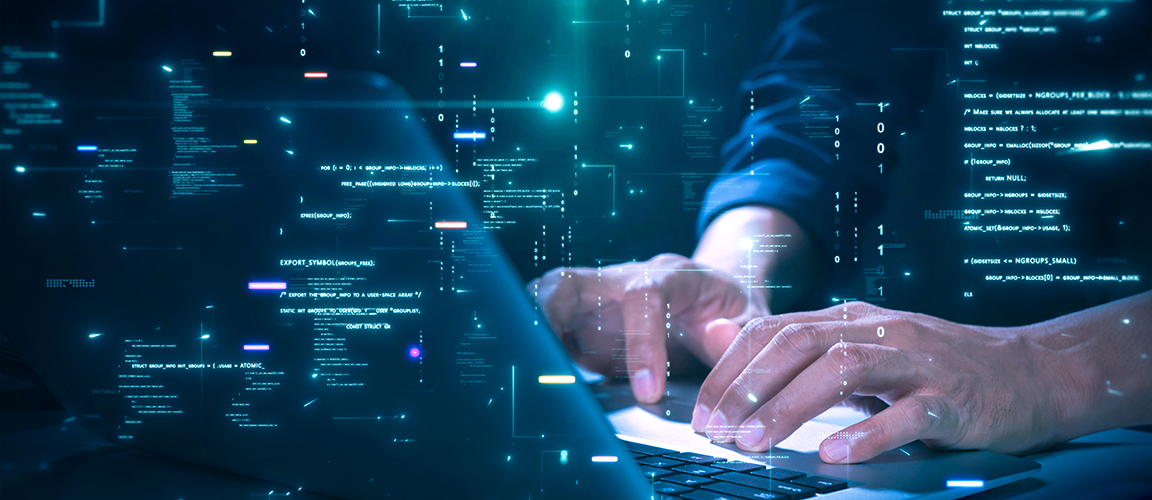 Happy college students and their teacher using computer in the classroom