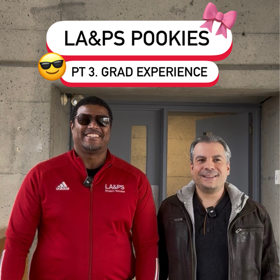 Two individuals stand in a campus hallway beneath a sign reading “LA&PS POOKIES PT 3. GRAD EXPERIENCE,” speaking to the camera as part of a social media video.