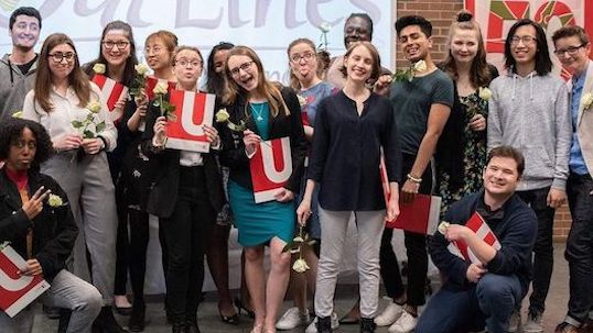 professional writing students social event group photo