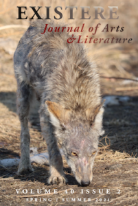 Coyote travels through cold environment on Existere journal cover page