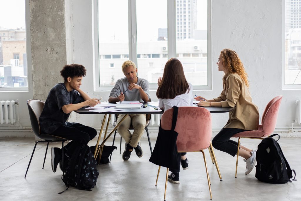 students sitting at a table