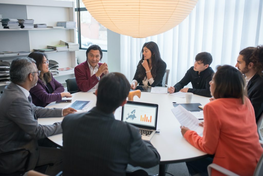 People sitting at a table and talking