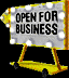 flashing sign saying open for business