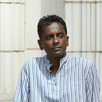Sri Lankan born Canadian writer Shyam Selvadurai gazing away