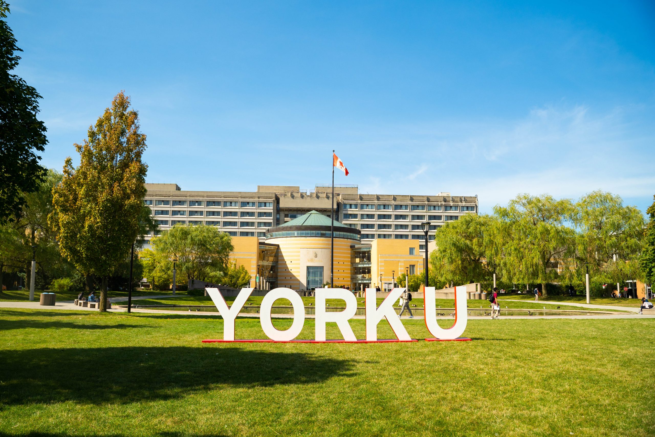 YorkU big sign in front of Vari Hall on a summer day