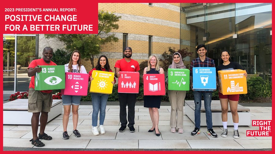 Image of President Rhonda Lenton and York students holding cubes representing the Sustainable Development Goals