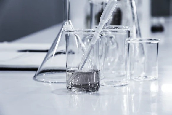 beakers on a white table