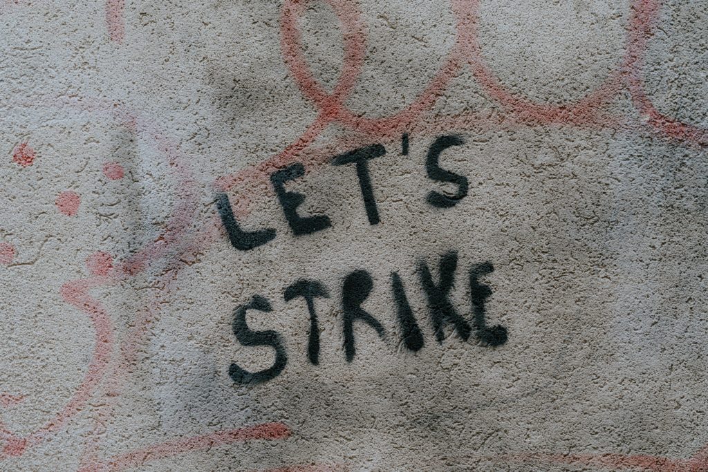 Graphitee saying: Let's Strike