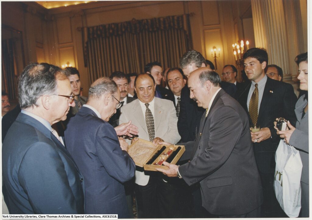 MP John Cannis welcomes the President of Greece, Kosti Stefanopoulos, at a reception held at the Grande Bretagne Hotel with a gift of Canadian Ice Wine.