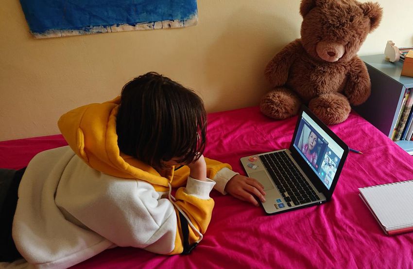 Student Phoebe Lawson-Morrow watches the online play from home. Photo credit: Martin Morrow