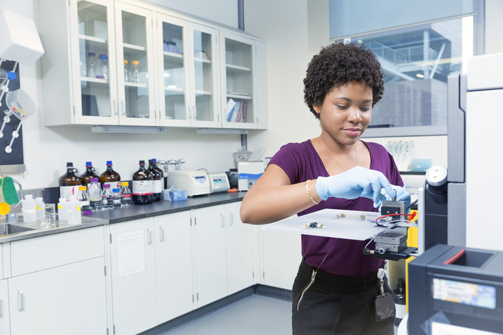 A researcher works in a lab.