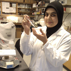 Master of Science student Hina Akhter working in the biology lab