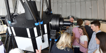 People viewing the telescope at the York U Observatory