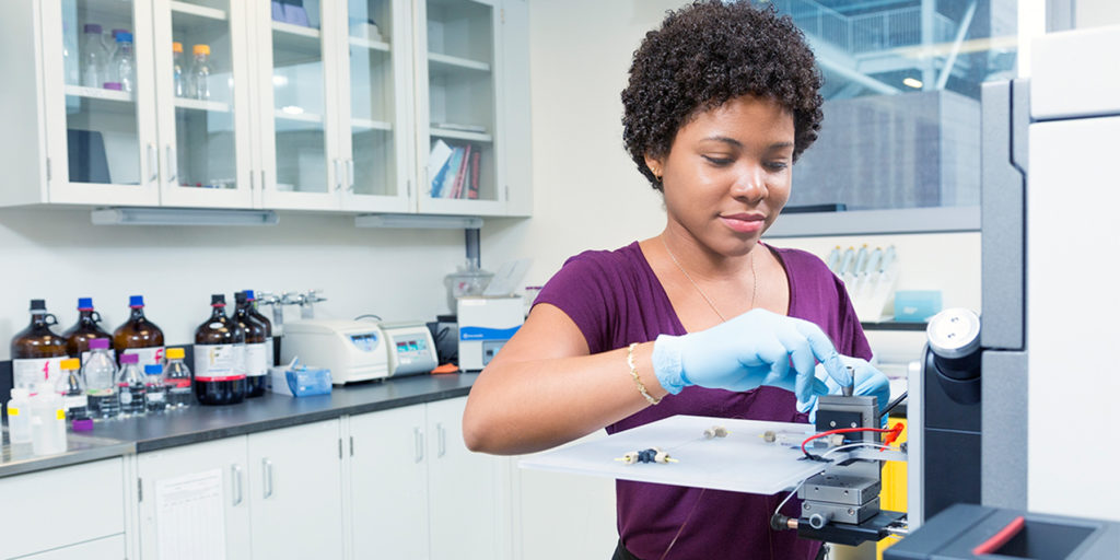 Black female York University science student in lab.