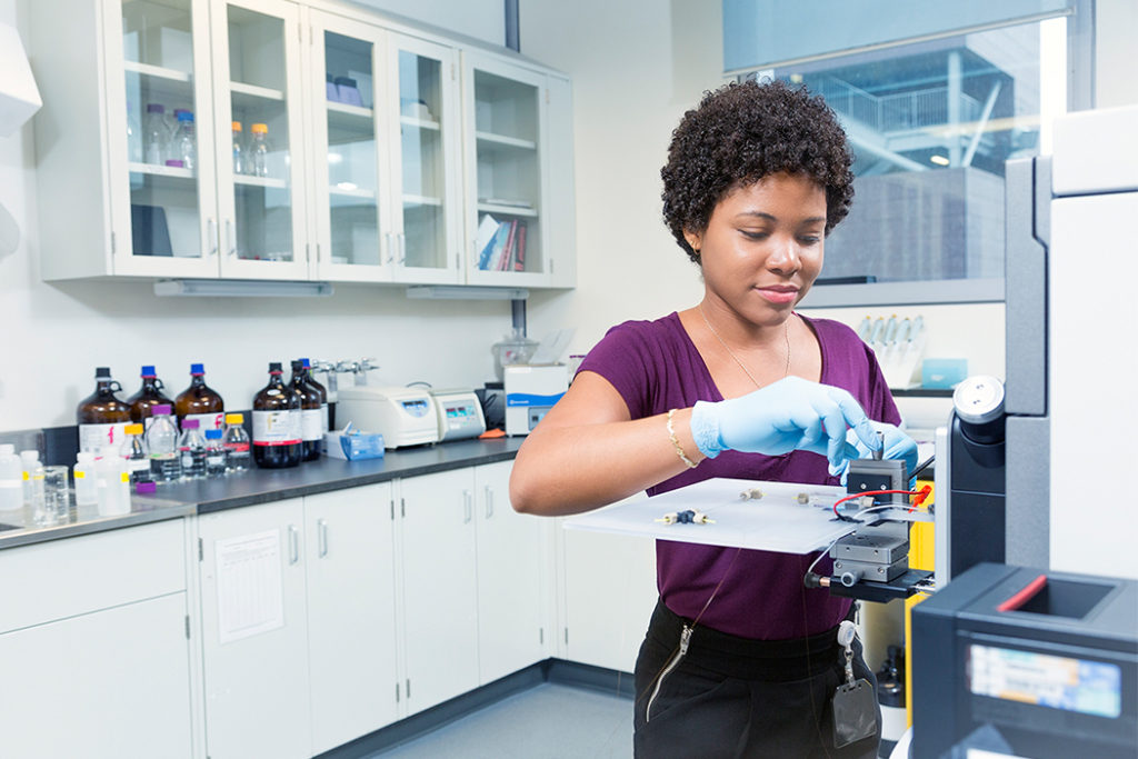 Black female science student in the lab.