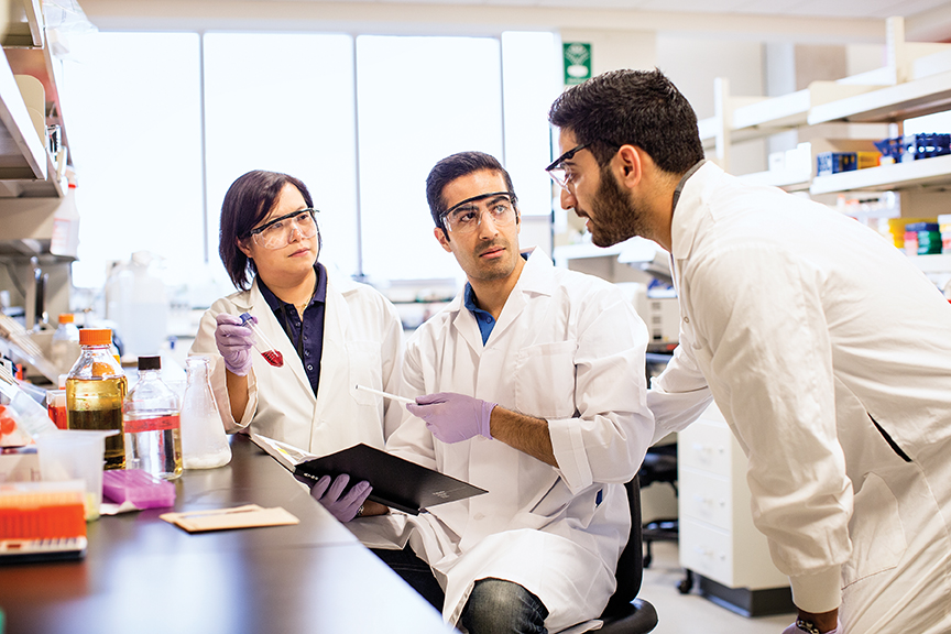 Three students in the science lab.