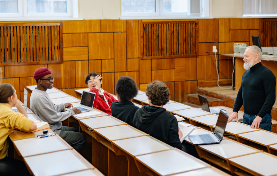 students and a professor in a lecure hall