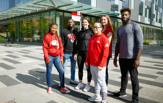 York students standing in front of the Life Sciences Building