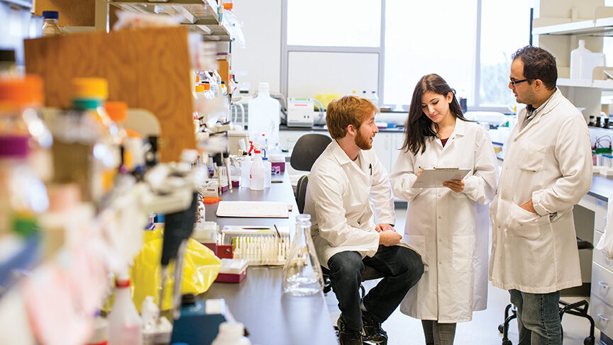 Three students in a York University Science lab