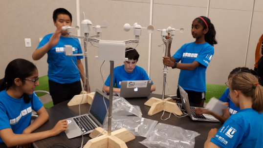 Students building a structure at the Science Engagement Programs