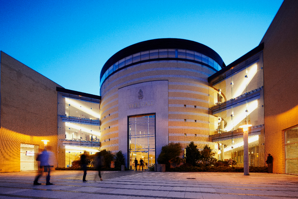 A low angle shot of Vari Hall at dusk.